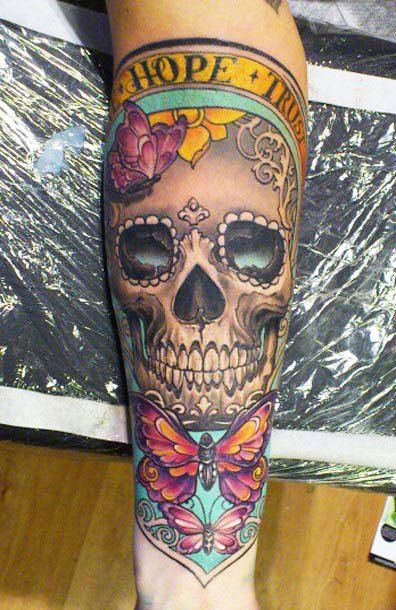 Colourful butterflies and skull tattoo by Ellen Westholm