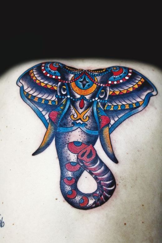 Colourful elephant tattoo by Eva Huber