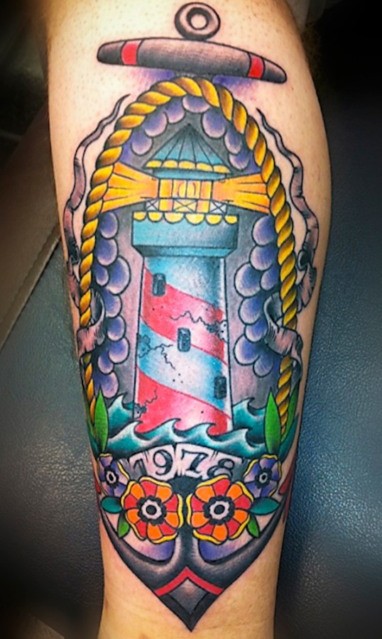 Colourful lighthouse arm tattoo