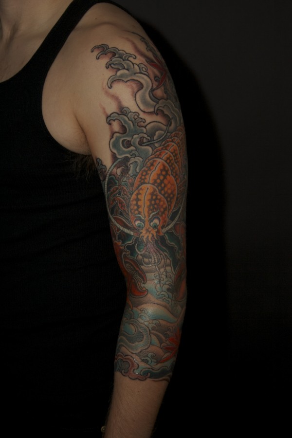 Colourful lobster arm tattoo