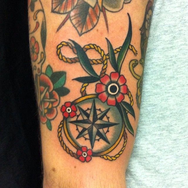 Compass and flowers tattoo