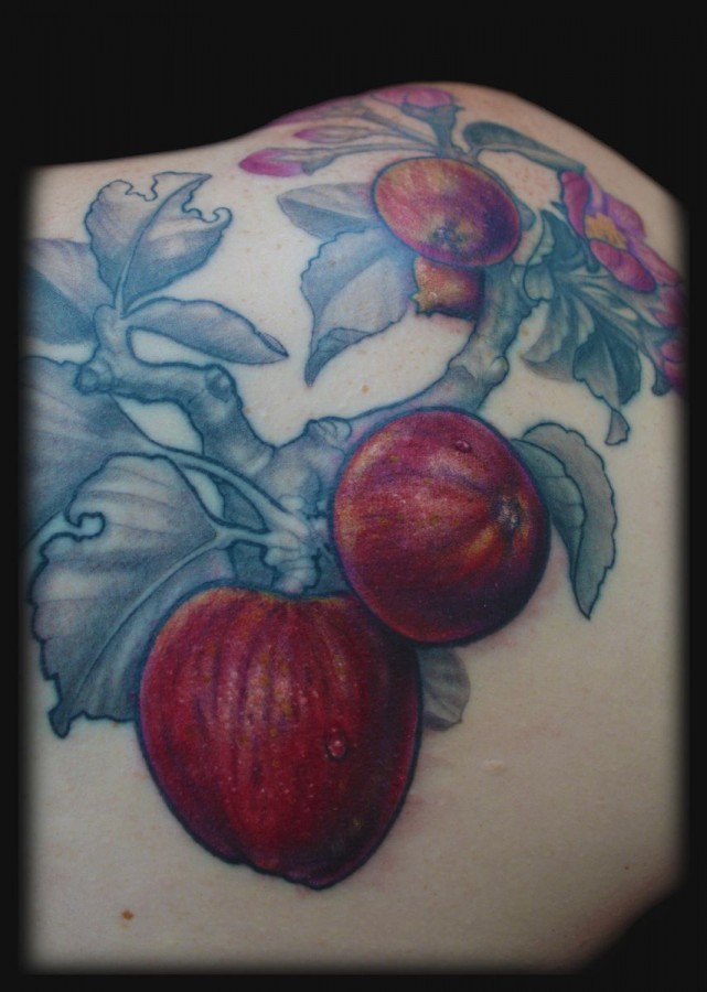 Cool apple branch tattoo