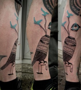 Cool birdcage tattoo by Expanded Eye