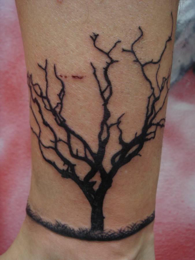 Cool dead tree tattoo