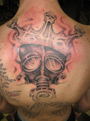 Cool gas mask back tattoo