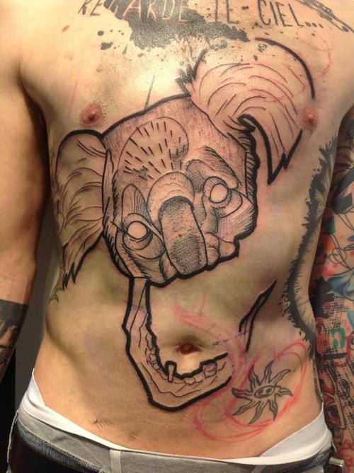 Cool koala’s head chest tattoo