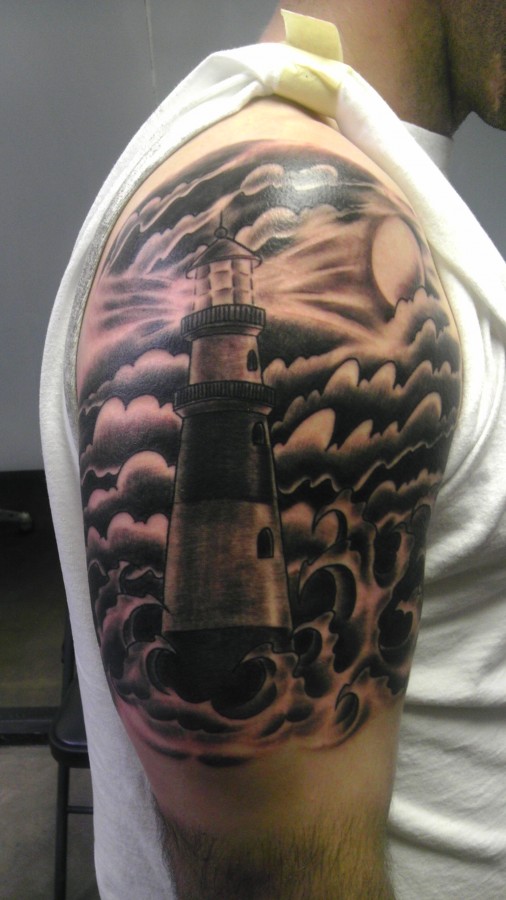 Cool lighthouse arm tattoo