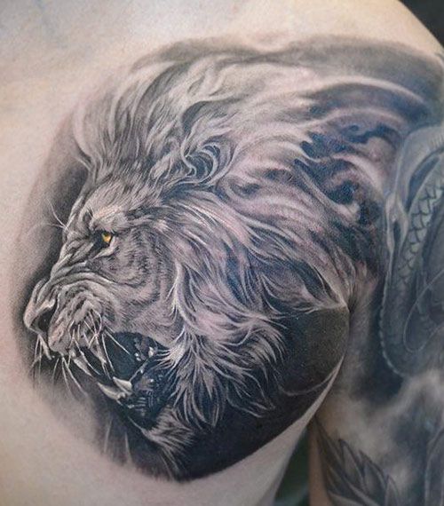 Cool lion tattoo by Elvin Yong