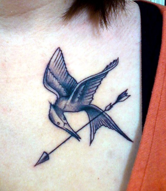 Cool mockingjay chest tattoo