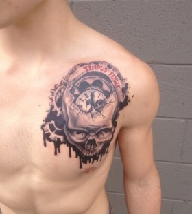 Cool skull clock chest tattoo