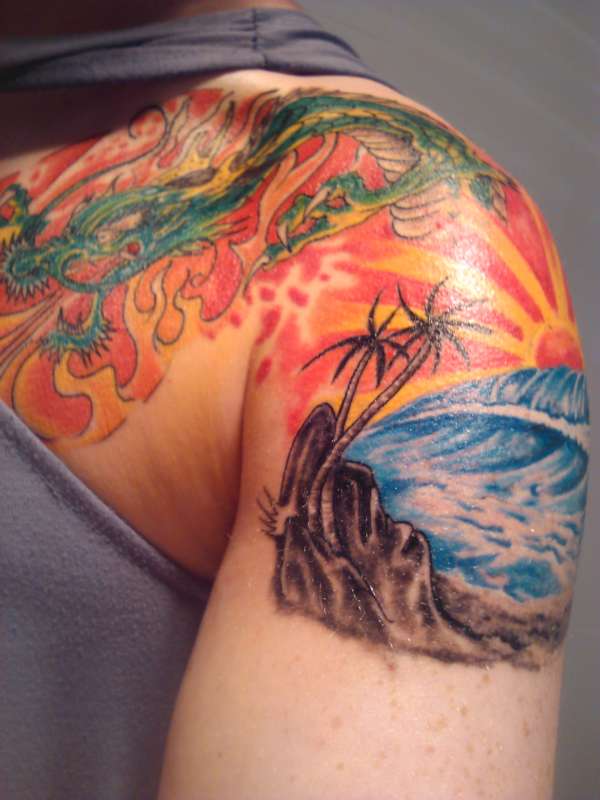 Cool sunset arm tattoo