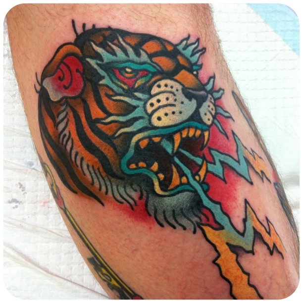 Cool tiger tattoo by W. T. Norbert