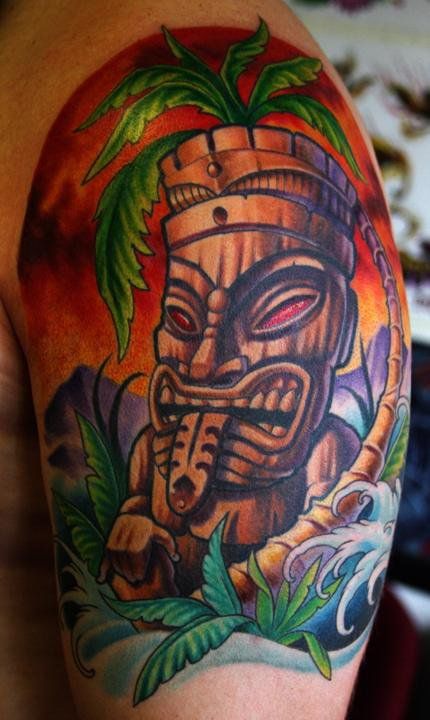 Cool tiki arm tattoo