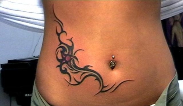 Cool tribal stomach tattoo