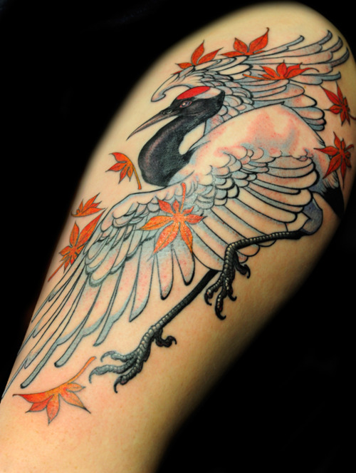 Crane and leaves tattoo