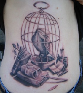 Creative birdcage tattoo design