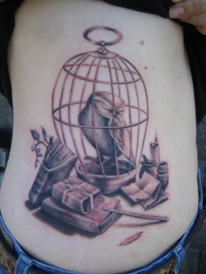 Creative birdcage tattoo design