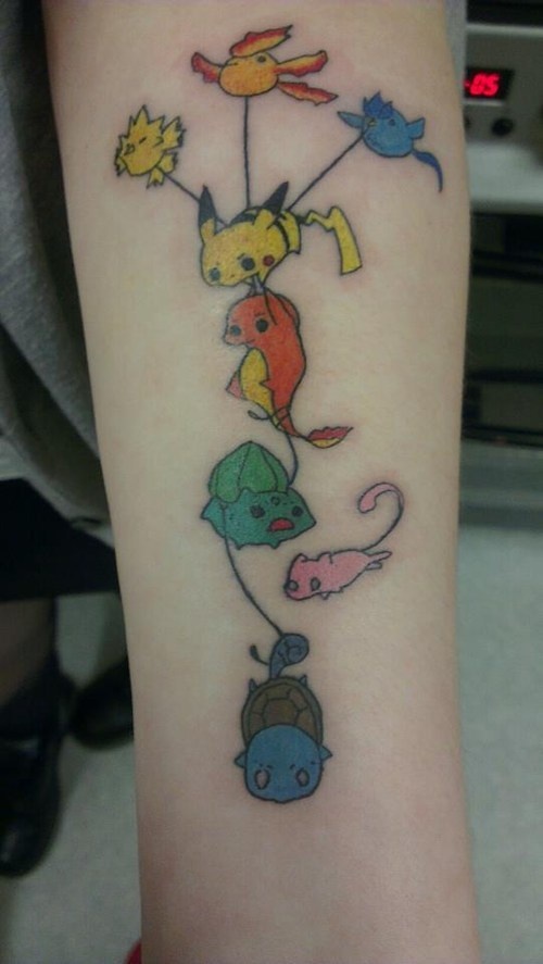 Creative pokemon arm tattoo