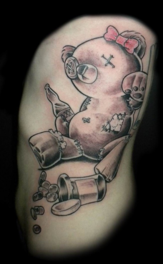 Creative teddy bear tattoo