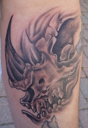 Creepy rhino skull tattoo