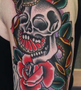 Creepy skull and cobra tattoo