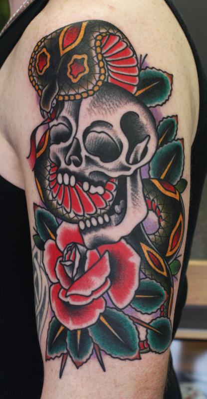 Creepy skull and cobra tattoo