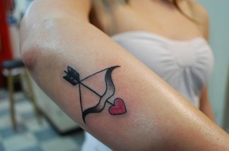 Cute bow and arrow tattoo