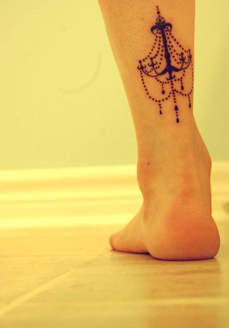 Cute chandelier leg tattoo