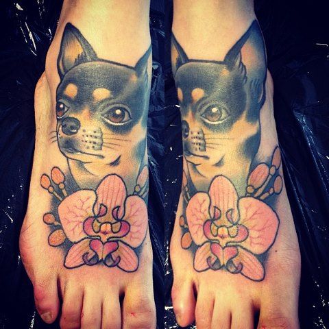 Cute dog foot tattoo by Alex Dorfler