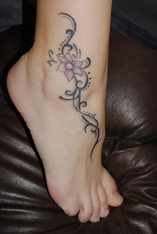 Cute flower tattoo on ankle