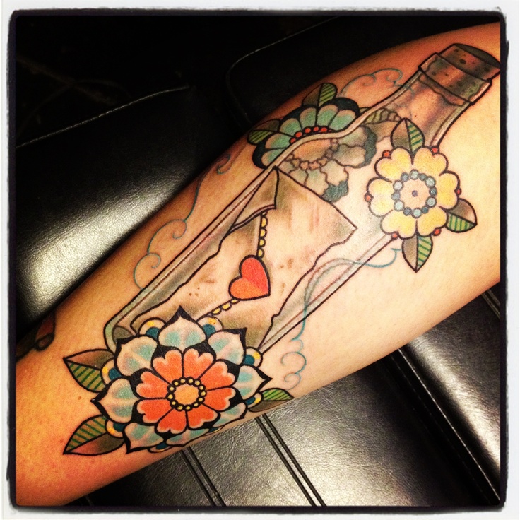 Cute flowers bottle tattoo