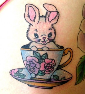 Cute rabbit in cup tattoo by lauren winzer