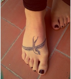 Cute swallow foot tattoo