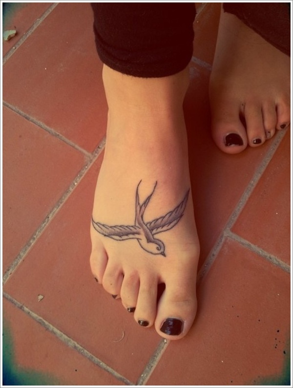 Cute swallow foot tattoo