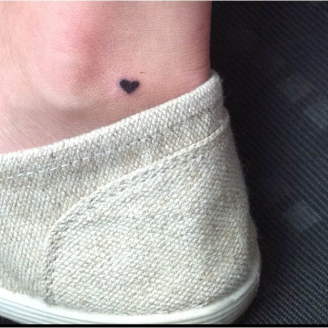 Cutest black heart tiny tattoo