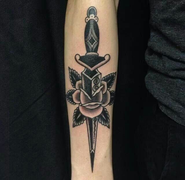 Dagger in a rose tattoo