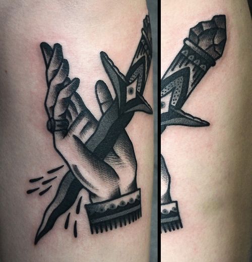 Dagger in hand tattoo by Philip Yarnell