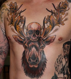Deer's head and skull tattoo