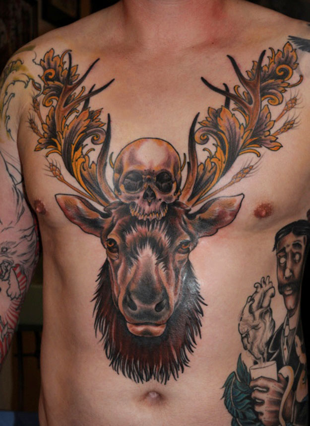 Deer’s head and skull tattoo