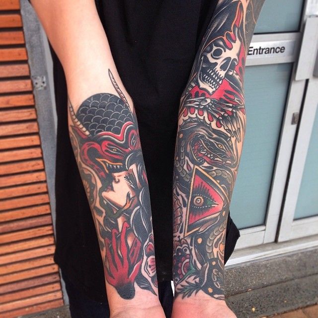 Devil and a woman arm tattoo by James McKenna