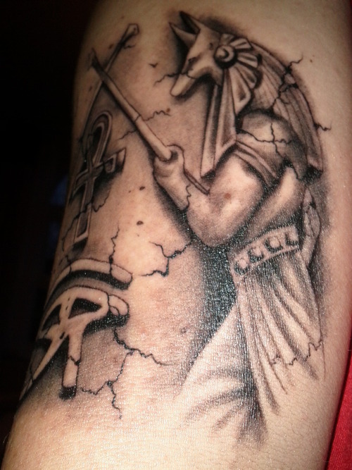 Egyptian god anubis grey ink tattoo