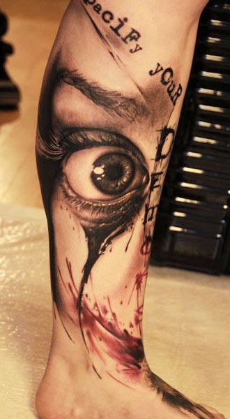 Eye tattoo on leg by Florian Karg