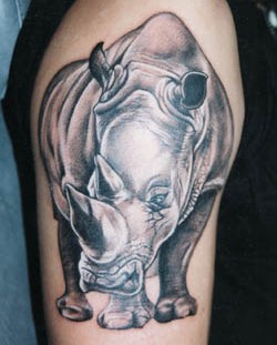 Fierce rhino arm tattoo