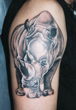 Fierce rhino arm tattoo