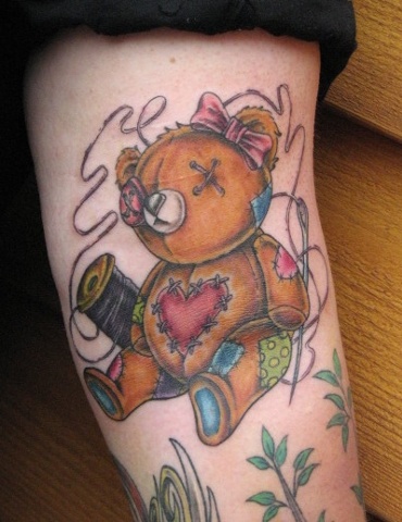 Fixed teddy bear tattoo