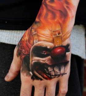 Flaming clown tattoo by Kyle Cotterman