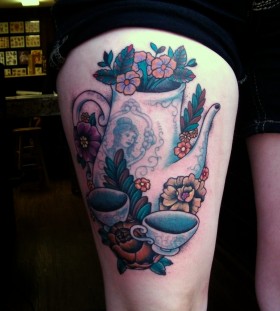 Flowers and teacups tattoo