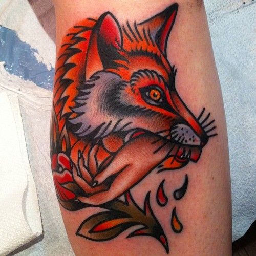 Fox bitting hand tattoo by Nick Oaks