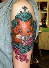 Fox frame arm tattoo