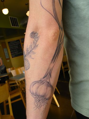 Full arm’s food tattoo